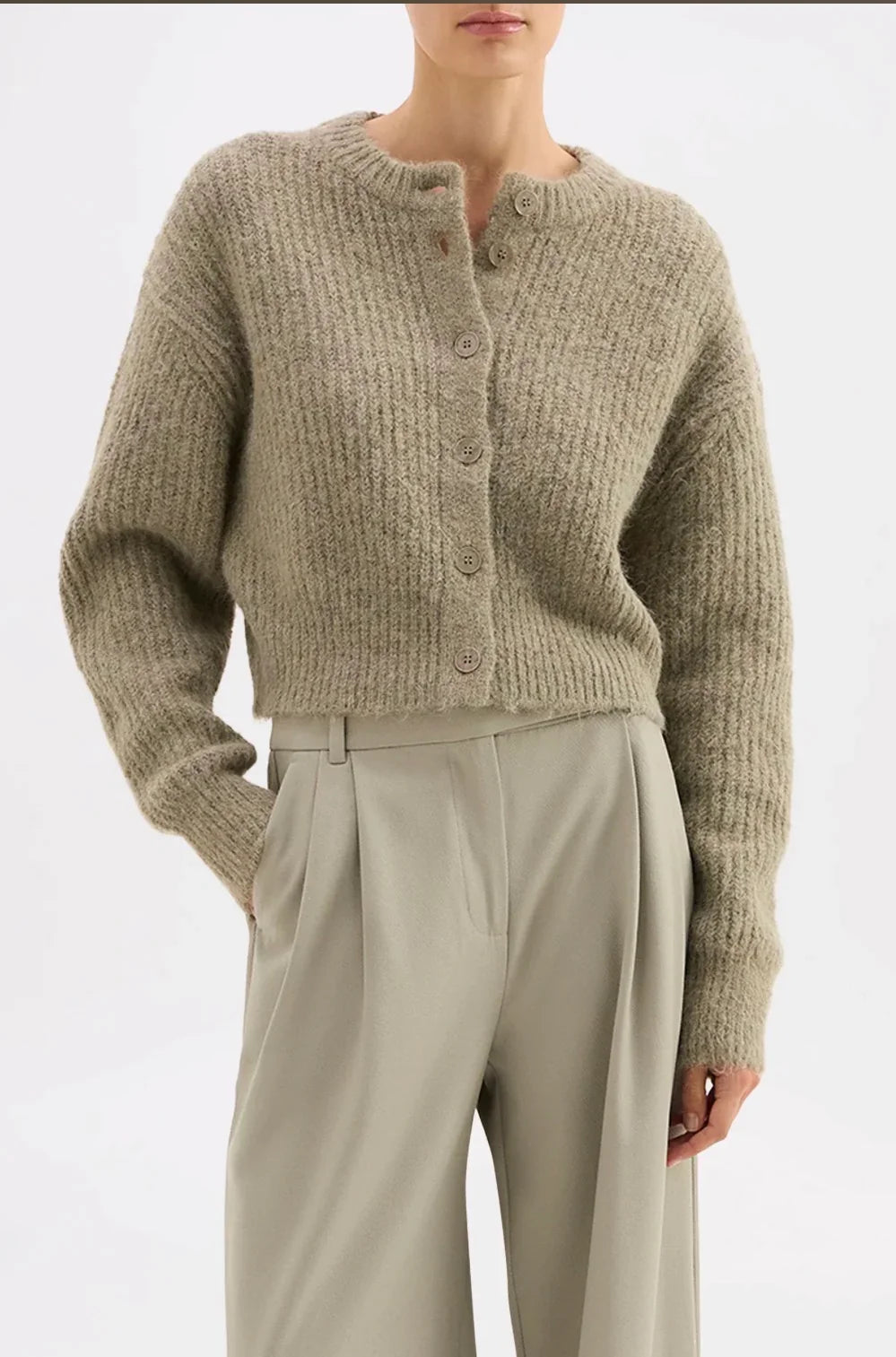 Cozy ribbed knit cardigan with buttons paired with wide-leg trousers for women's fashion
